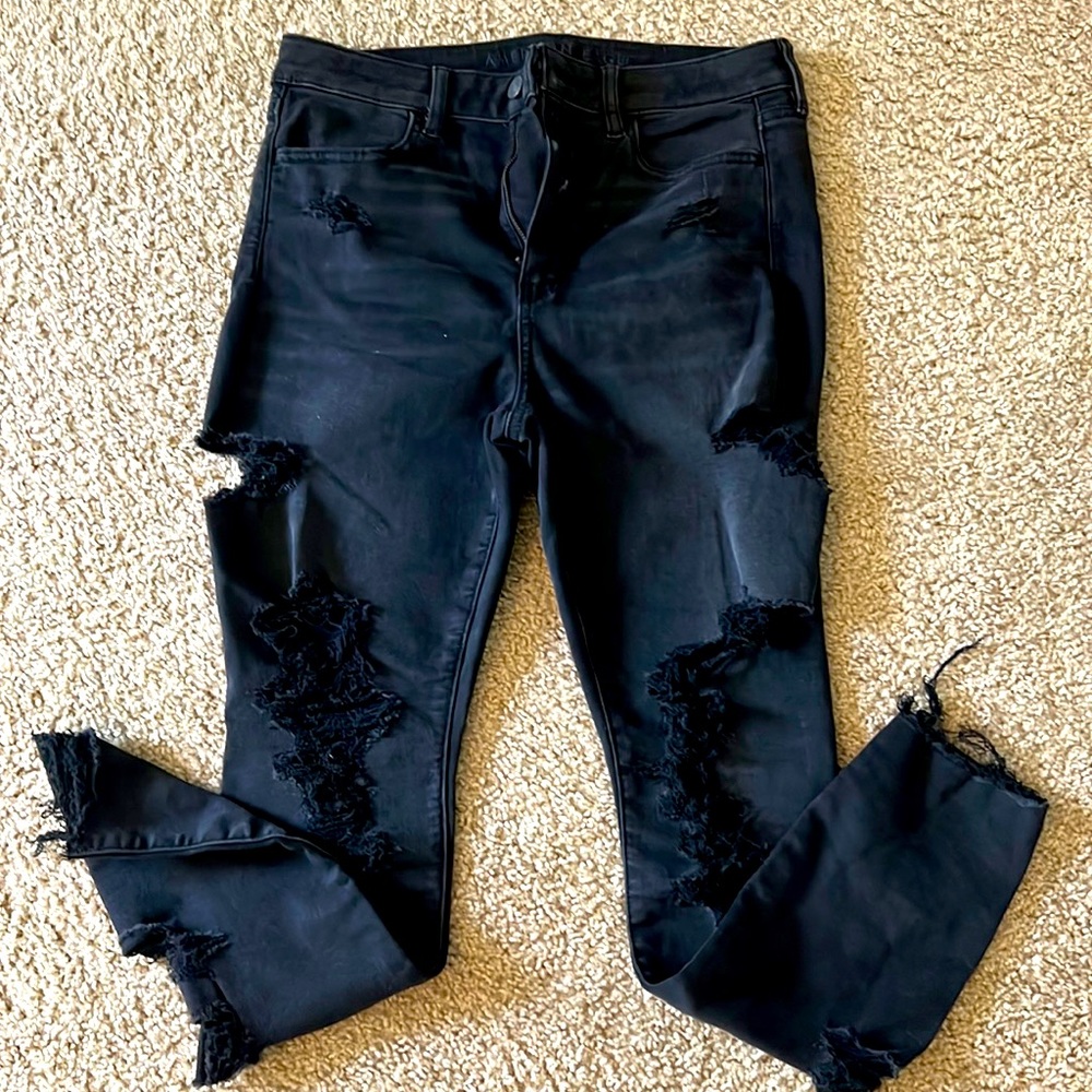 Black American Eagle ripped jeans.